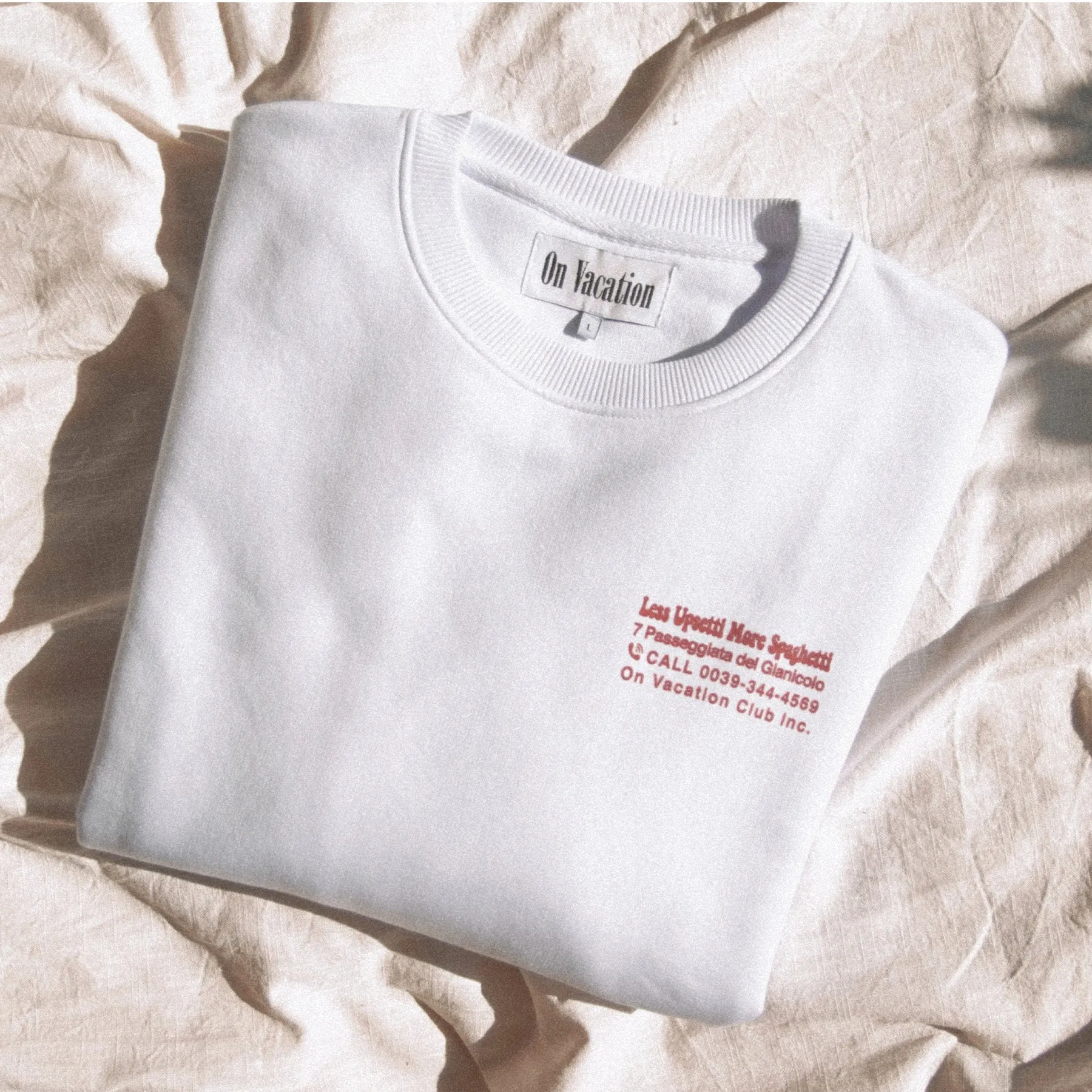 Less Upsetti Sweater - White